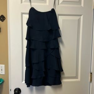 Navy strapless ruffle dress by BCBGMaxazria.